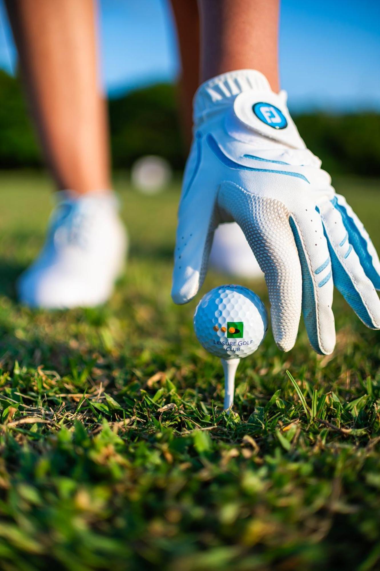 Diamonds Leisure Beach & Golf Resort Diani Beach Esterno foto Golf ball on a tee
