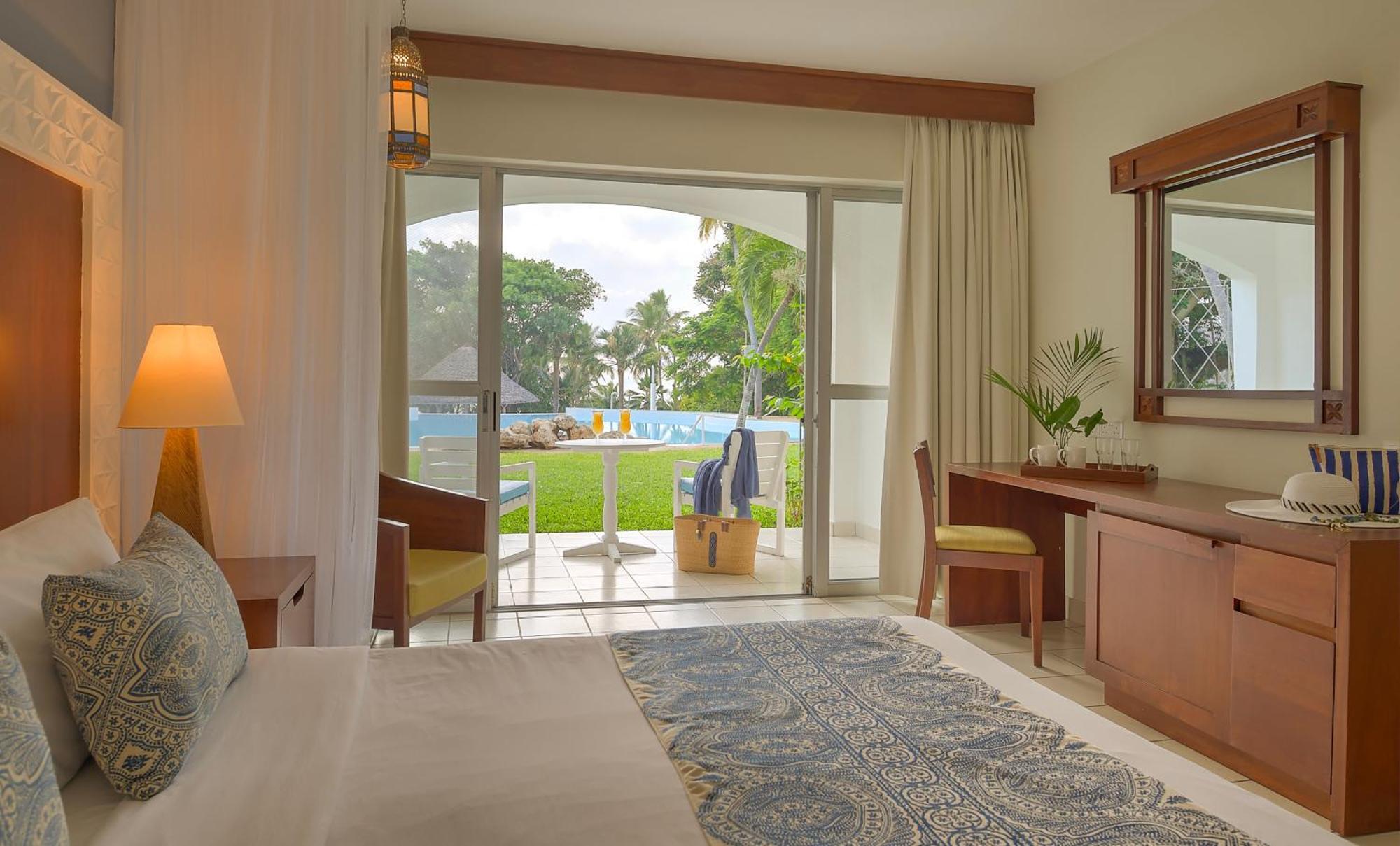 Diamonds Leisure Beach & Golf Resort Diani Beach Esterno foto A room at the resort